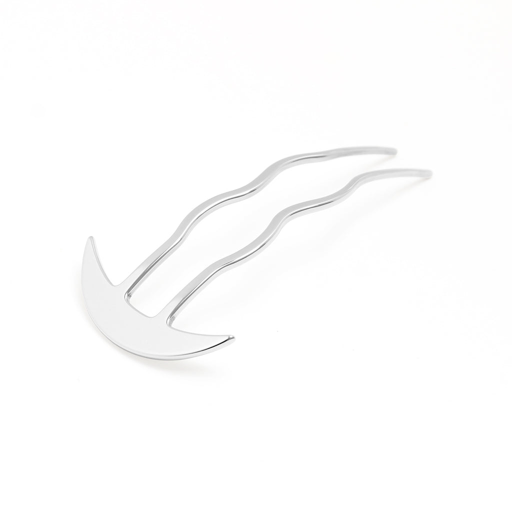 Silver hair clip on a white background