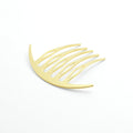 The gold Arcliner Comb kanzashi hairpin with 5 tapered prongs on a white background